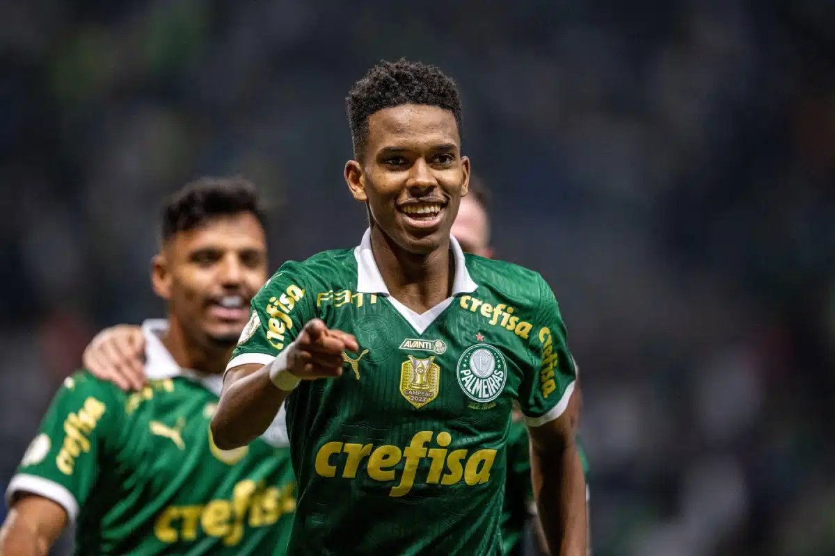 Estevao Willian of Palmeiras celebrates after assist in goal by Raphael Veiga during the Campeonato Brasileiro Serie A football match between Palmeiras and Athletico Goianiens.