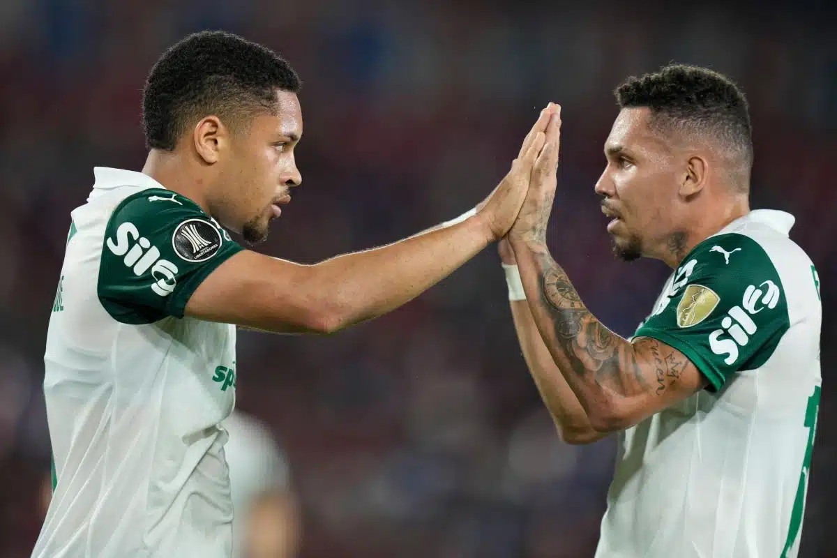 Vitor Roque of Brazil's Palmeiras celebrates with Paulinho after scoring their side's second goal during a Copa Libertadores Group G soccer match