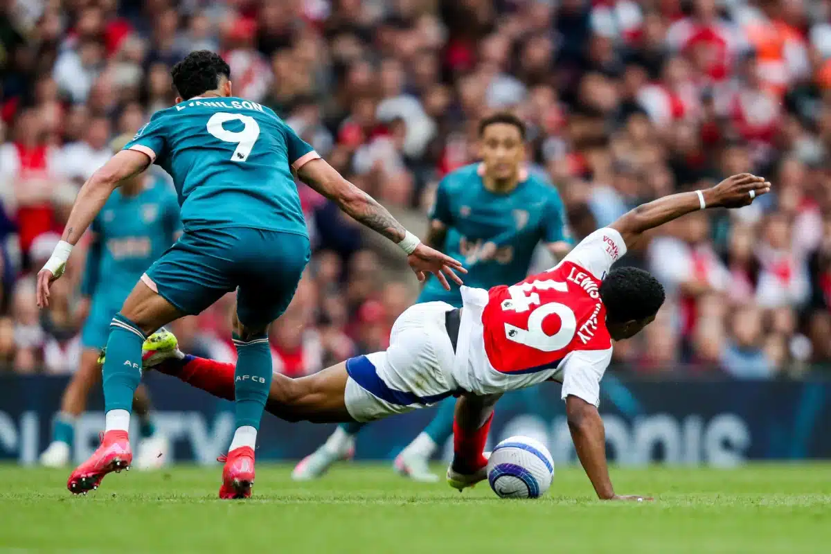 Myles Lewis-Skelly of Arsenal is challenged by Evanilson of AFC Bournemouth during the Premier League match Arsenal vs Bournemouth, 3 May 2025